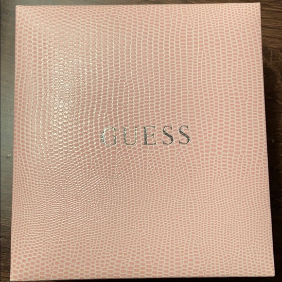 A guess break cancer pink diamond watch
